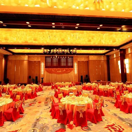 Gloria Grand Hotel Wuxi Уси Ресторан фото