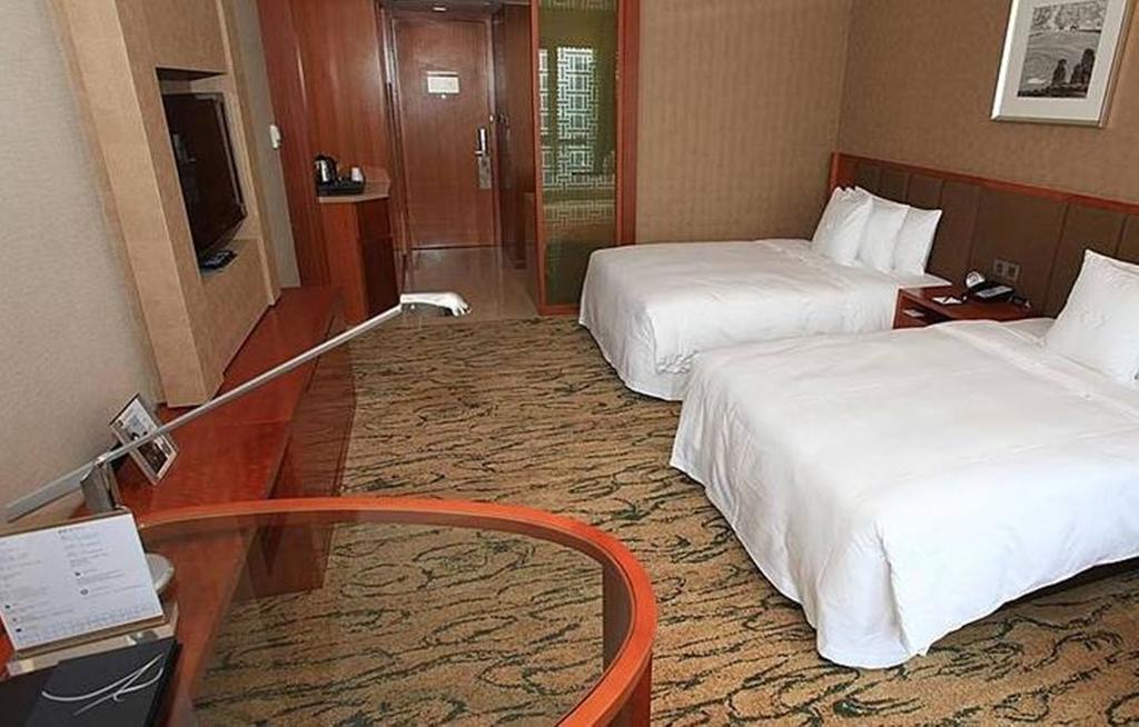 Gloria Grand Hotel Wuxi Уси Экстерьер фото