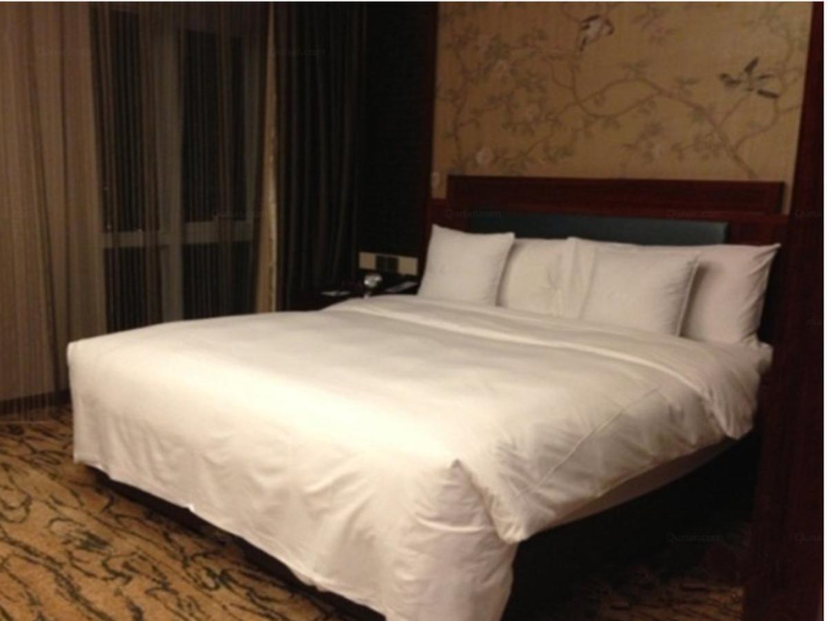 Gloria Grand Hotel Wuxi Уси Экстерьер фото