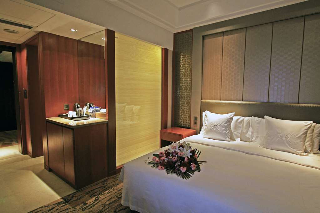 Gloria Grand Hotel Wuxi Уси Номер фото