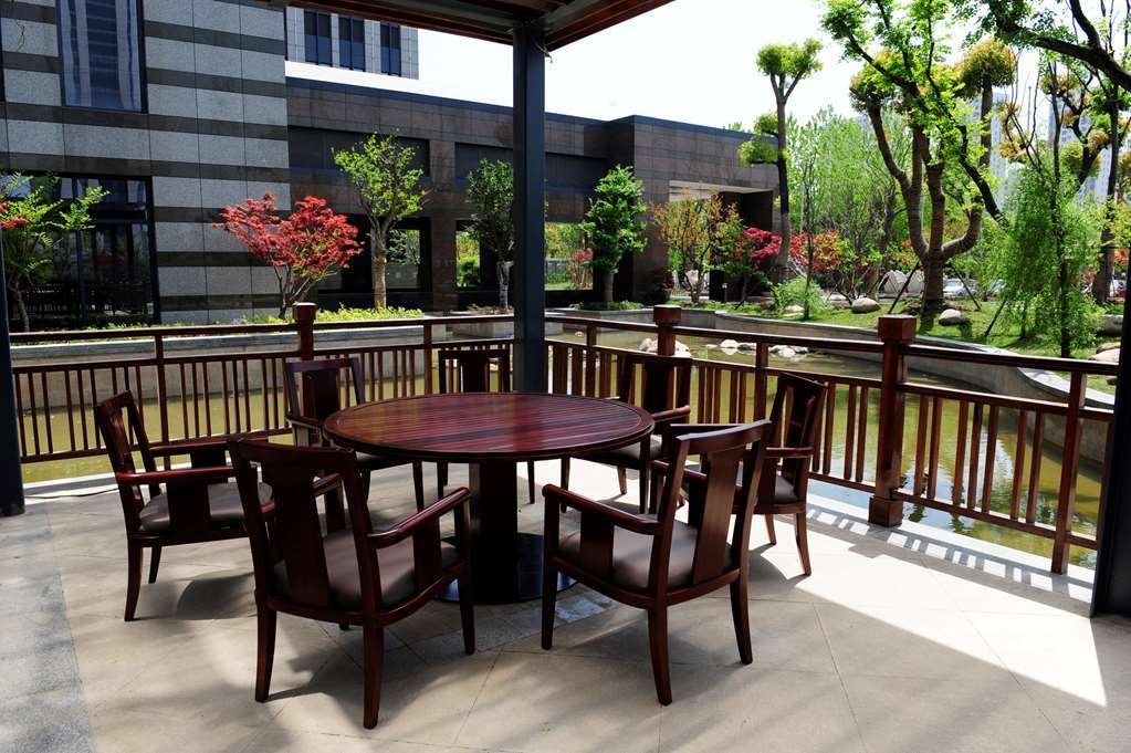 Gloria Grand Hotel Wuxi Уси Ресторан фото