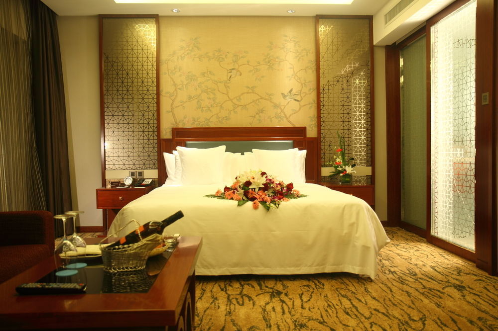 Gloria Grand Hotel Wuxi Уси Экстерьер фото